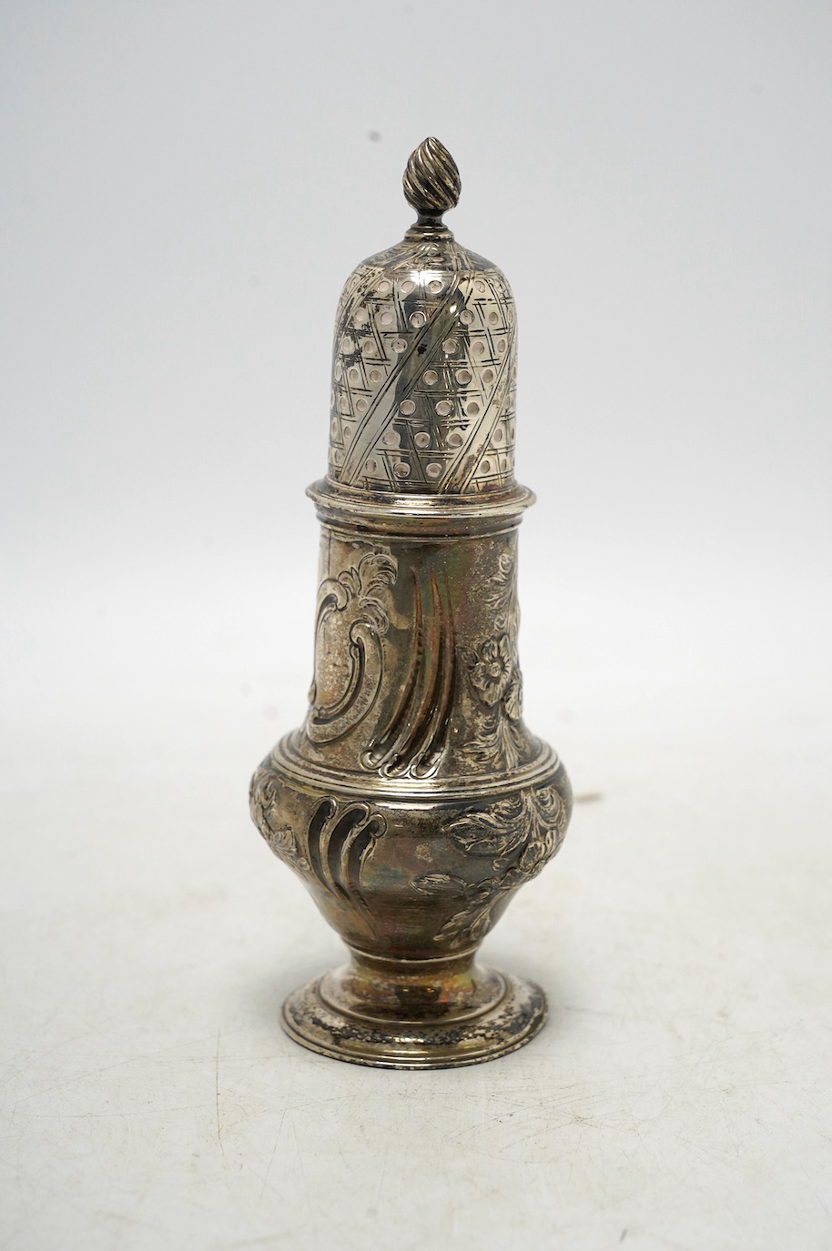 A George III silver baluster sugar castor, Robert Peaston, London, 1770, 16cm, 5.6oz. Condition - poor